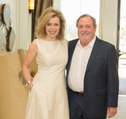 man and woman at awards ceremony